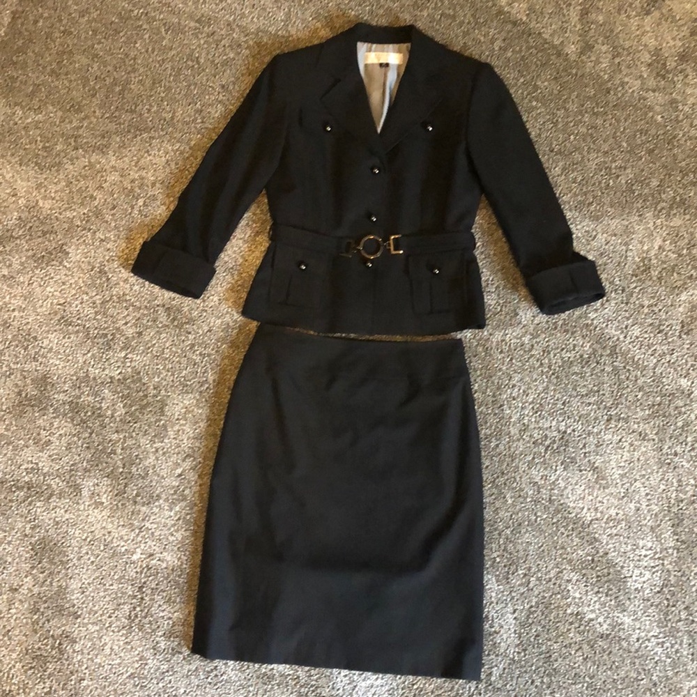 Black with white pinstripe business suit.